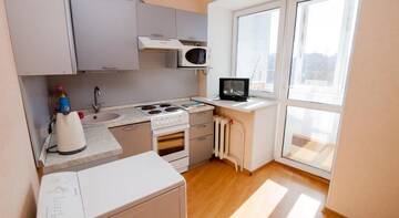 Фото номера Стандартные апартаменты Гостиница Kosmos Apartments na Sovetskoy г. Сыктывкар 4