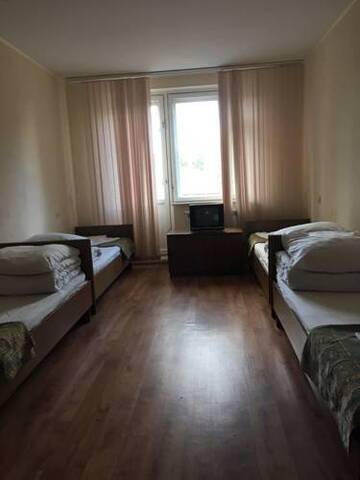 Фото номера Четырехместный номер эконом-класса Гостиница Severnaya Zvezda Hotel г. Сыктывкар 5