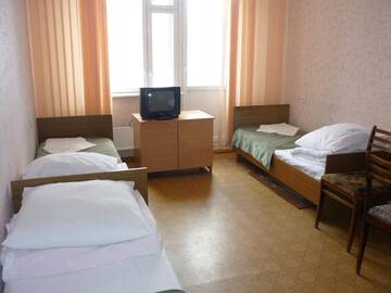 Фото номера Четырехместный номер эконом-класса Гостиница Severnaya Zvezda Hotel г. Сыктывкар 3